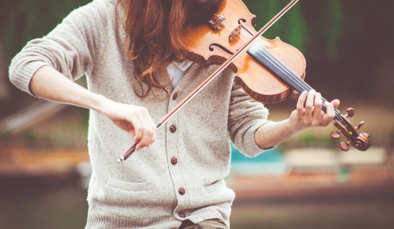 a violinist practicing songs that she chose