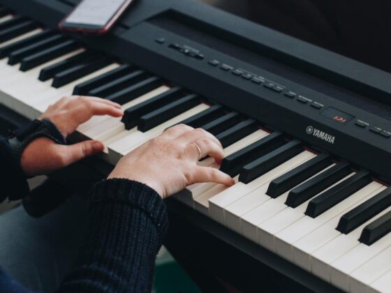 a beginner playing an easy piano song in c major